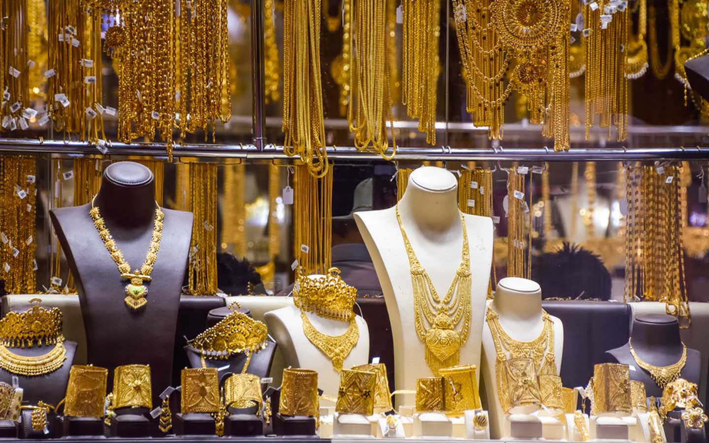 Professional gold evaluation with Karatmeter testing equipment at Cash for Gold BHARAT